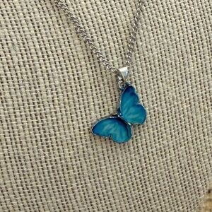 Blue Butterfly Pendant with a silver tone chain Necklace